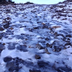 Ice-encrusted ski hill path. Yikes!